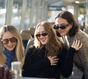 3 female friends taking selfie